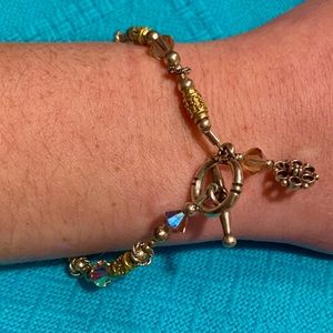 Gold and silver tone bangle bracelet